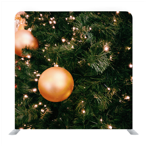 Bright Gold Balls On Christmas Tree Of Fir Or Spruce With String Rice Lights Bulbs Backdrop - Backdropsource